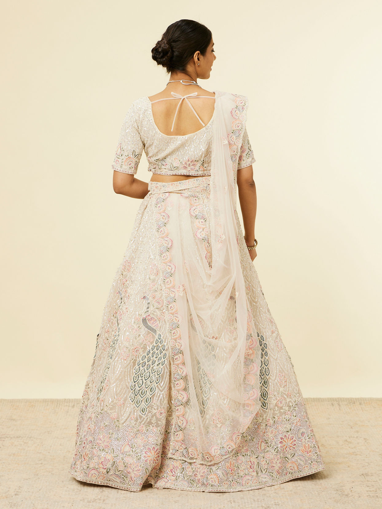 alt message - Mohey Women Beige Cream Sitara Embroidered Lehenga with Stone Work image number 4